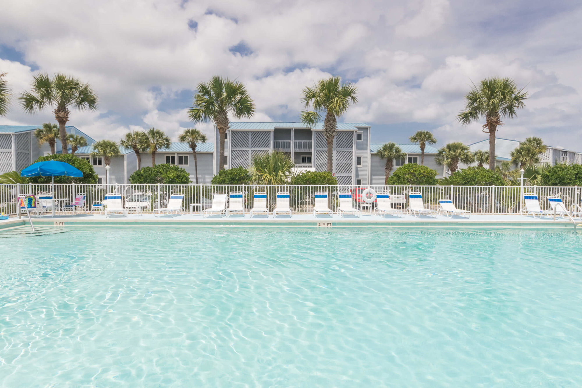 Large outdoor pool and sundeck at Sundown condos in Perdido Key
